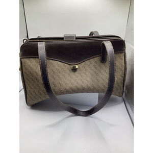 CL America leather logo bag brown and beige.